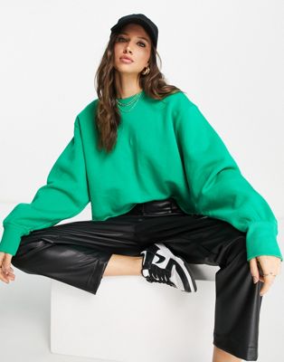 ASOS DESIGN oversized sweatshirt with raw hem in bright green