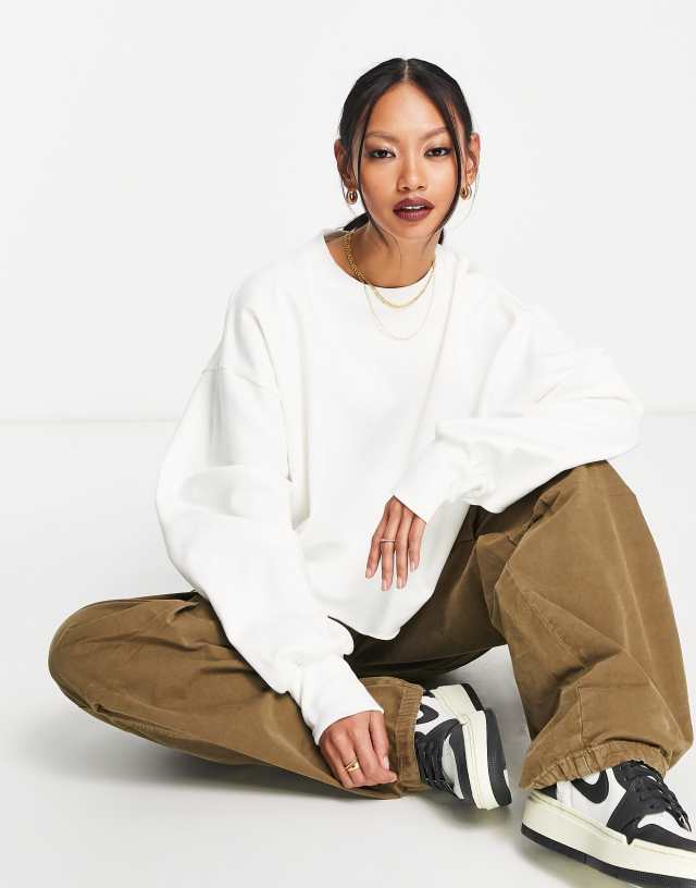 ASOS DESIGN oversized sweatshirt with raw hem in cream