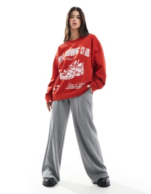 Asos Design Oversized Sweatshirt With Running Club Graphic In Red