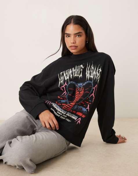 ASOS DESIGN Oversized sweatshirt with snake rock graphic in black - view 1