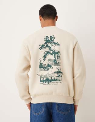 ASOS DESIGN oversized sweatshirt with souvenir print in beige-Neutral