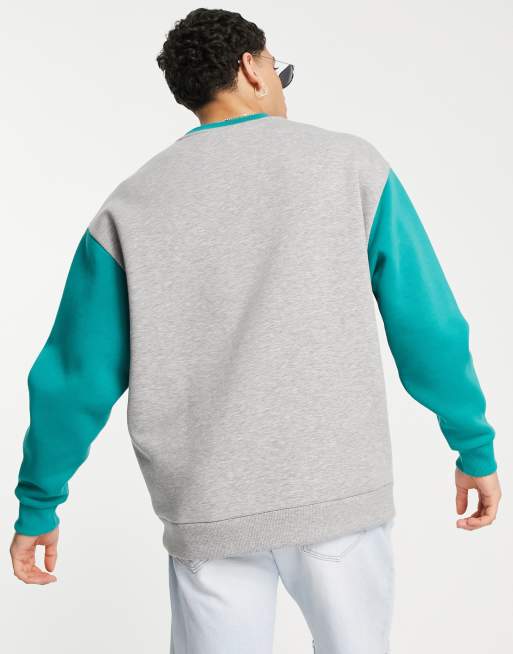 ASOS DESIGN sweatshirt with contrast raglan sleeves and raw edge