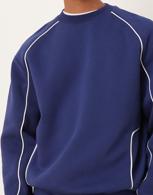 ASOS DESIGN oversized sweatshirt with white piping in blue