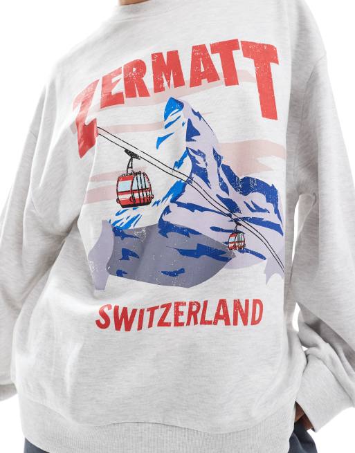 ASOS DESIGN oversized sweatshirt with Zermatt print in ice marl ASOS