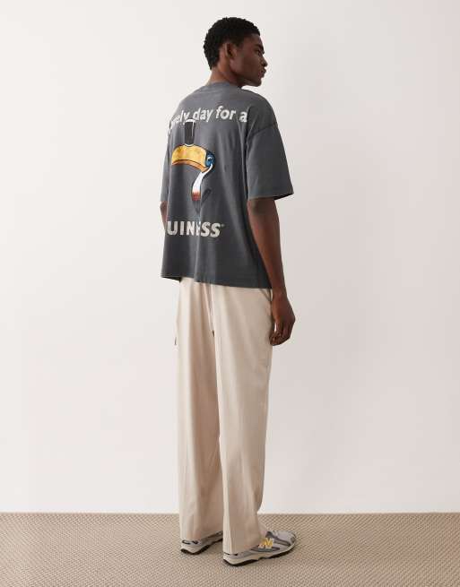 ASOS DESIGN - Oversized T-shirt i forvasket sort med Guinness-print, 2 af 5