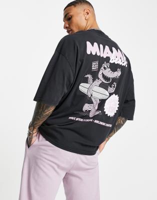 ASOS DESIGN - Oversized T-shirt i forvasket sort med 'Miami'-print i tegneseriestil