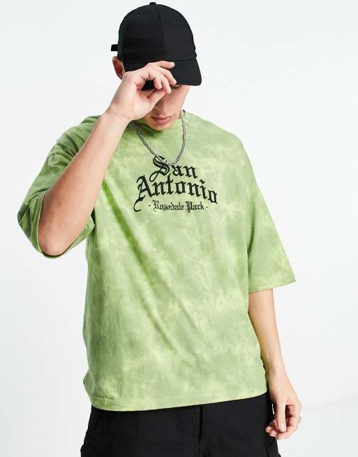 ASOS DESIGN - Oversized T-shirt i grøn bleget vask med byprint på brystet