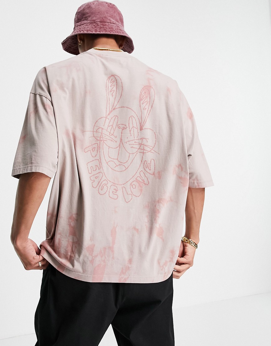 ASOS DESIGN - Oversized T-shirt i lyserød batikfarve med print bagpå