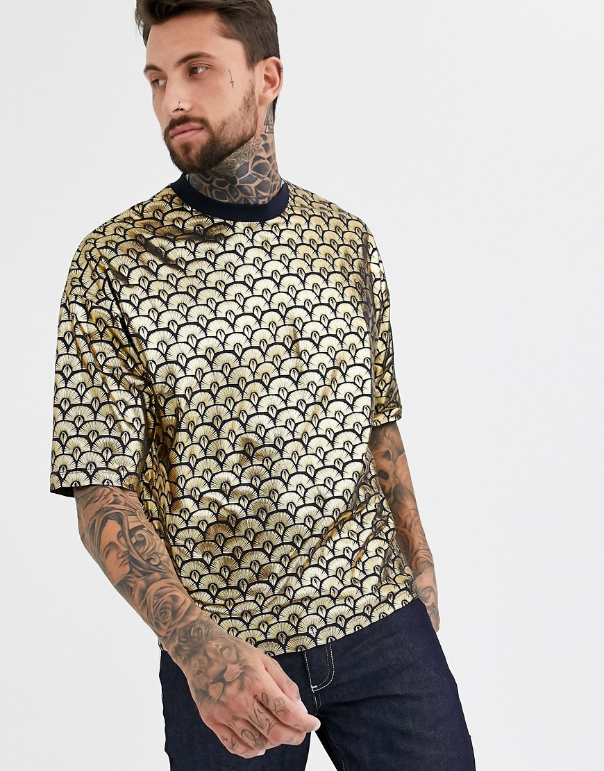 ASOS DESIGN oversized t-shirt in all over deco style gold foil print