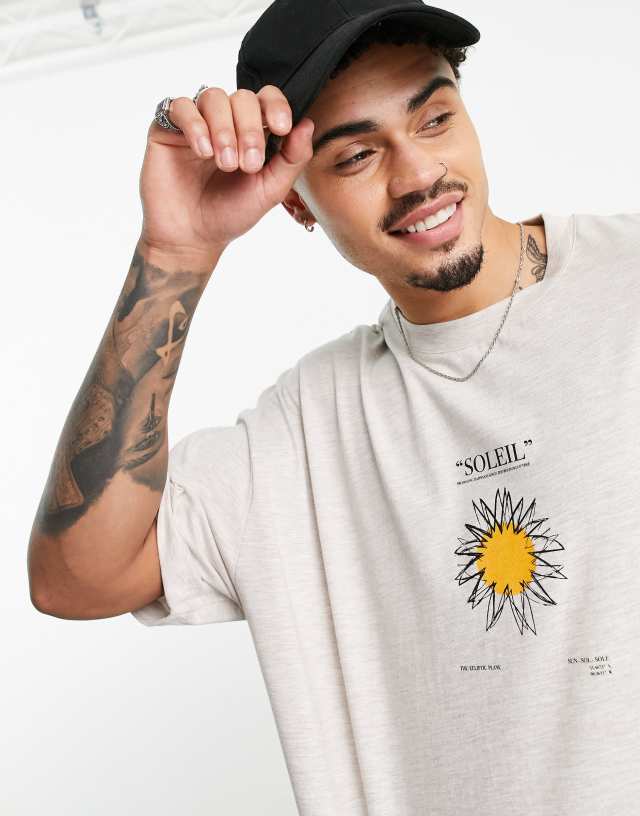 ASOS DESIGN oversized t-shirt in beige with sun chest print