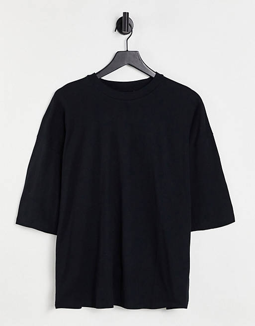 Men oversized t-shirt in black organic cotton blend with graphic back print 