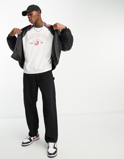 ASOS DESIGN oversized t-shirt in black raglan color block with city print , 4 of 4