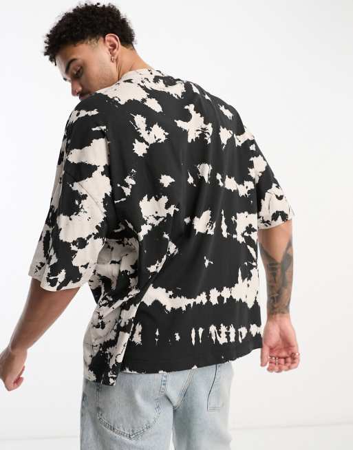 ASOS DESIGN oversized t-shirt in black tie dye with front city print