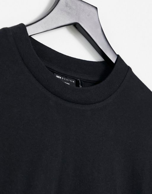 ASOS DESIGN oversized T-shirt in black with back text print