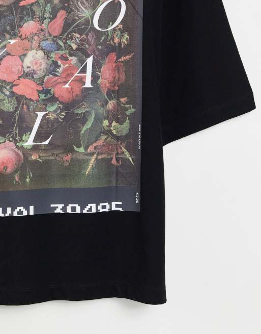 ASOS DESIGN oversized T-shirt in black with photographic spine