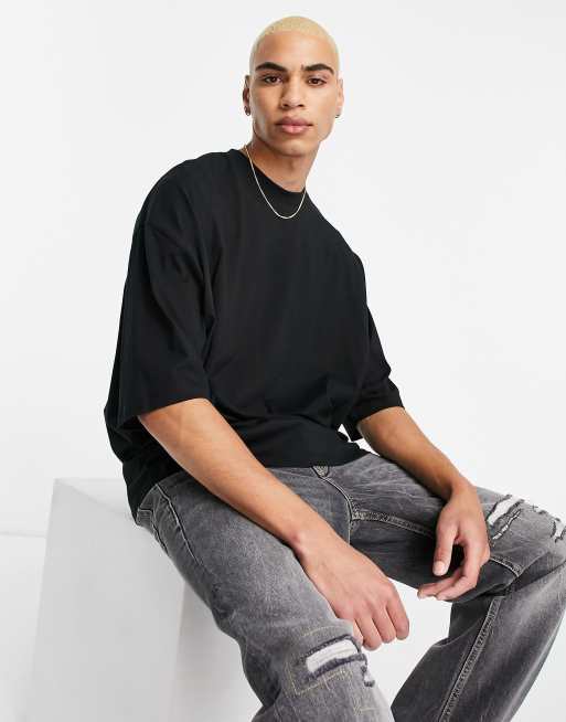 ASOS DESIGN oversized T-shirt in black with photographic spine