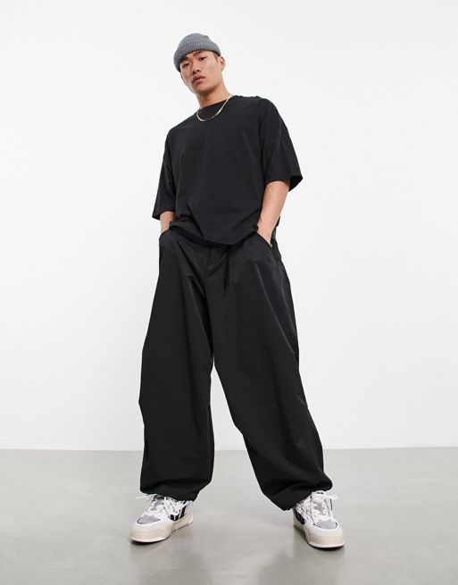 ASOS DESIGN oversized T-shirt in black with photographic spine
