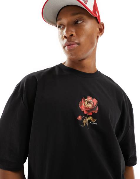 ASOS DESIGN oversized t-shirt in black with rose chest print - view 1