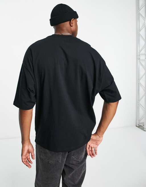 ASOS DESIGN oversized t-shirt in black with rose print | ASOS