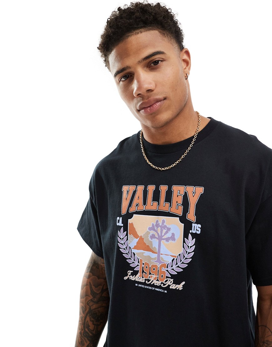 ASOS DESIGN oversized t-shirt in black with valley sport chest print