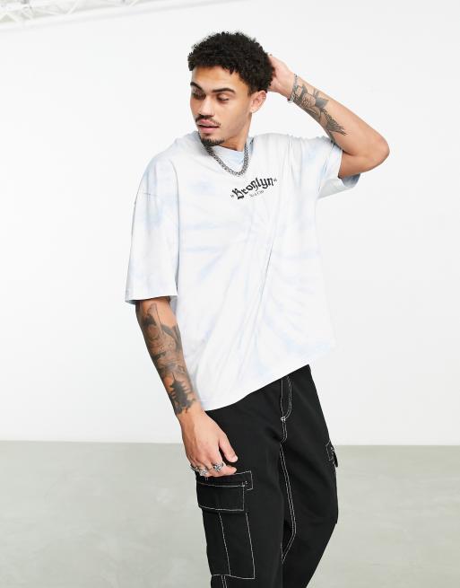 ASOS DESIGN oversized t-shirt in white with blue multi placement print