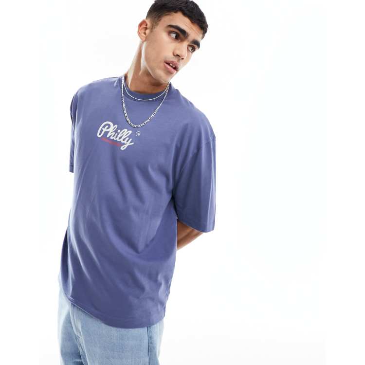 ASOS DESIGN oversized T-shirt in blue with city chest print