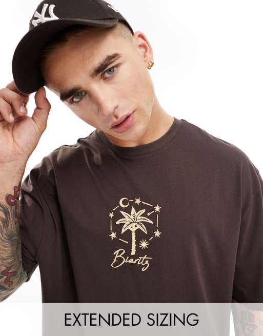 ASOS DESIGN - Oversized T-shirt in bruin met palmboomprint op de borst