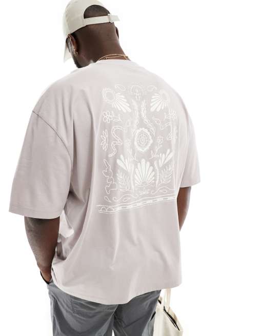 ASOS DESIGN oversized t-shirt in dusty pink with celestial back print