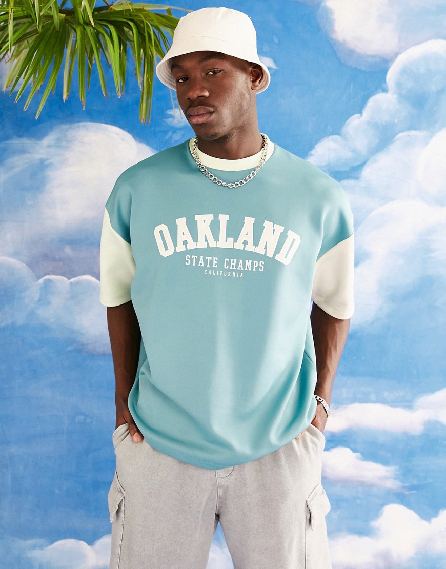 ASOS DESIGN oversized t-shirt in green color block with Oakland city print in scuba