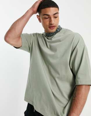 ASOS DESIGN oversized t-shirt in green with text print neck detail