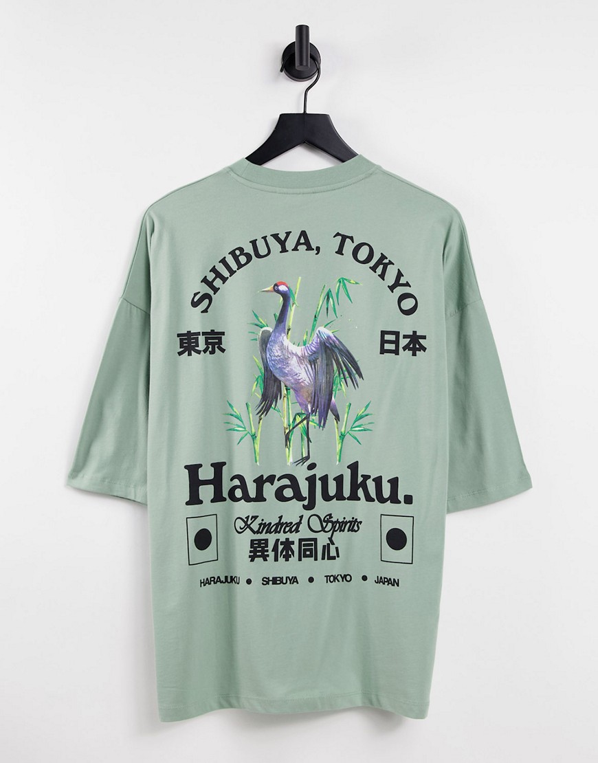 ASOS DESIGN - Oversized t-shirt in groen met 'souvenir'-print op de borst en rug