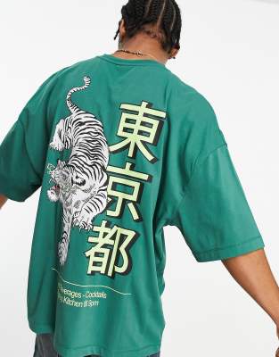 ASOS DESIGN - Oversized T-shirt in groen met souvenirprint op de achterkant
