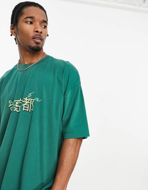 ASOS DESIGN - Oversized T-shirt in groen met souvenirprint op de achterkant, 2 van 4