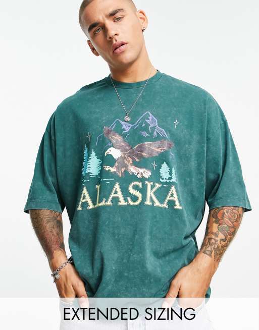 ASOS DESIGN - Oversized T-shirt in groene wassing met vintage Alaska-print
