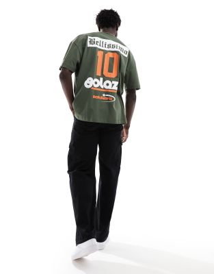 ASOS DESIGN oversized t-shirt in khaki with motosport front and back print