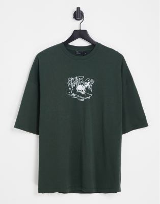 ASOS DESIGN oversized t-shirt in khaki with skate front print