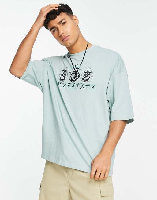 ASOS DESIGN oversized t-shirt in light blue with chest symbol & text ...