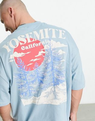 ASOS DESIGN oversized t-shirt in light blue with outdoors back print