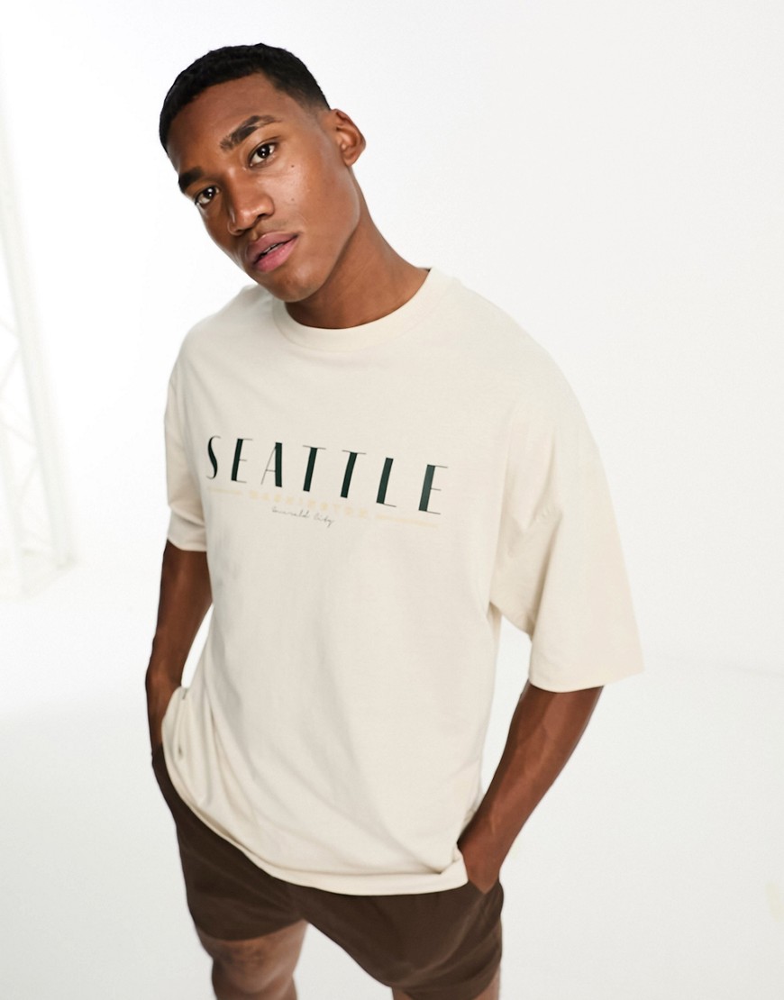 ASOS DESIGN oversized t-shirt in off white with city chest print