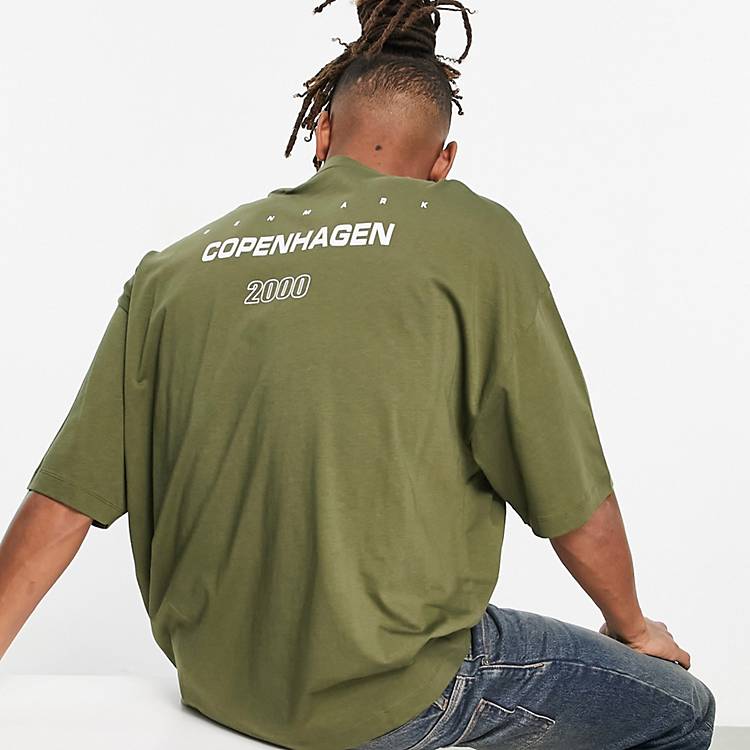 ASOS DESIGN oversized t-shirt in olive night with city print