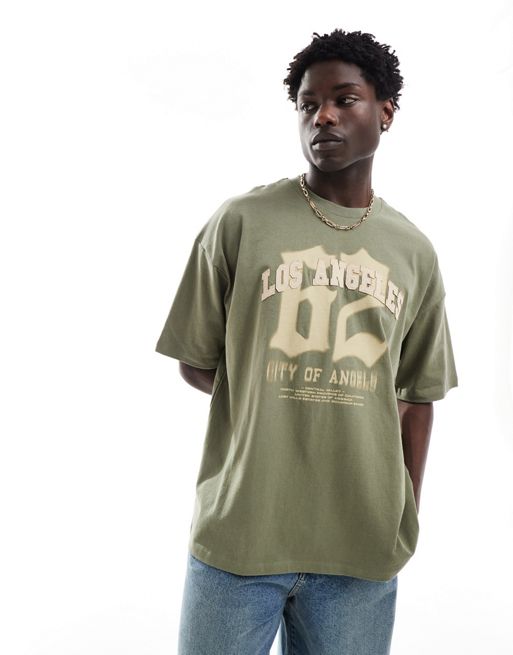 ASOS DESIGN oversized t-shirt in olive with front print and applique