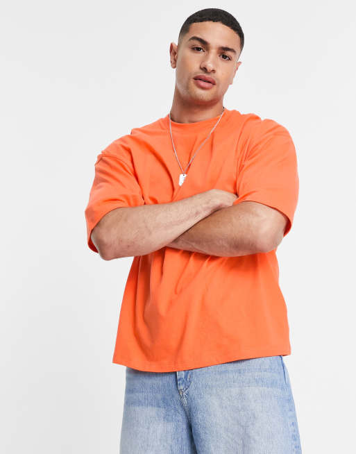 ASOS DESIGN oversized t-shirt in orange with text back print