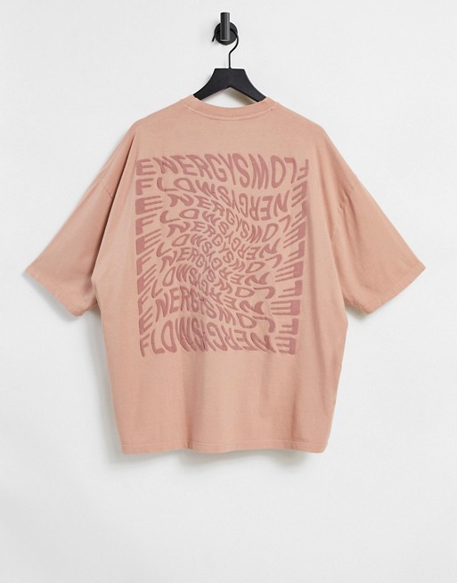 ASOS DESIGN oversized t-shirt in pink with back text print
