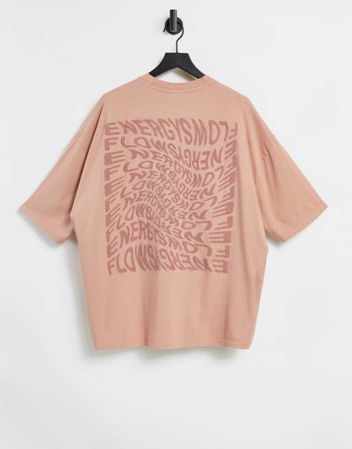 ASOS DESIGN - Oversized T-shirt in roze met tekstprint op achterkant