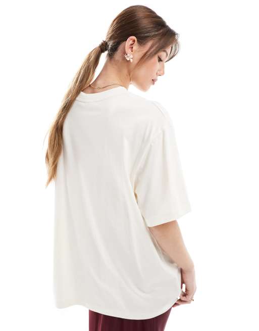 ASOS DESIGN Oversized t shirt in texture with Running Club Graphic in cream