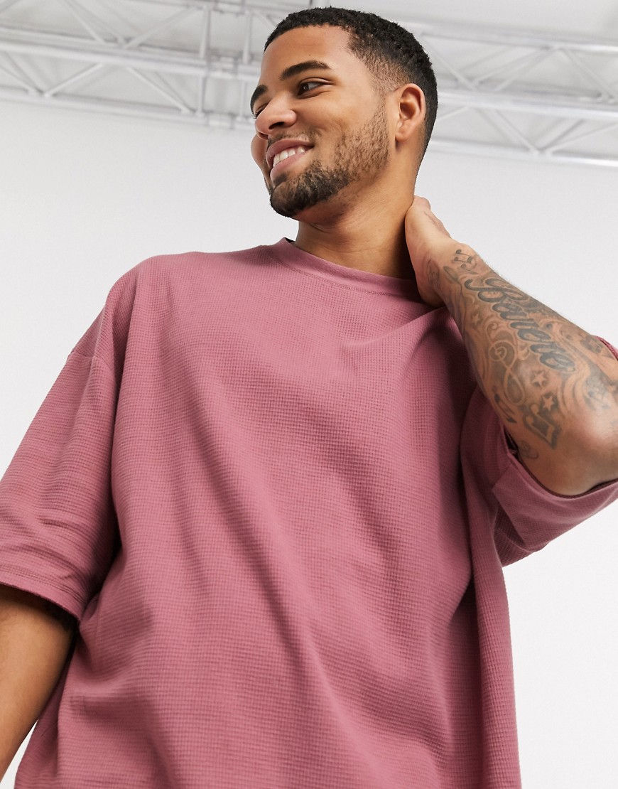 ASOS DESIGN - oversized t-shirt in wafelstructuur en distressing in roze-paars