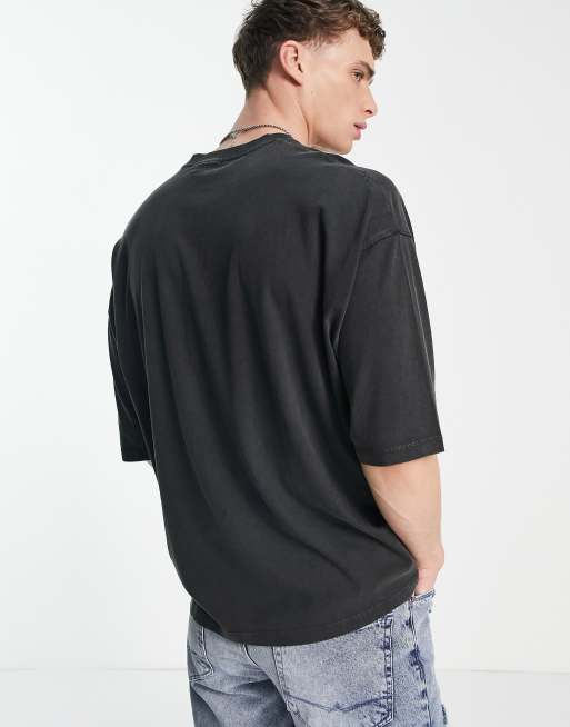 ASOS DESIGN oversized t-shirt in washed black with leopard front