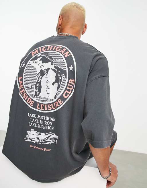 ASOS DESIGN oversized tshirt in washed black with sports club back