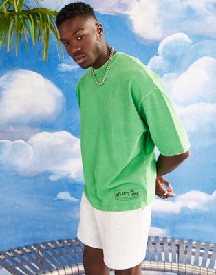 ASOS DESIGN oversized t-shirt in washed green with Atlanta print