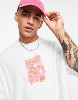ASOS DESIGN oversized T-shirt in white with floral drawing front print